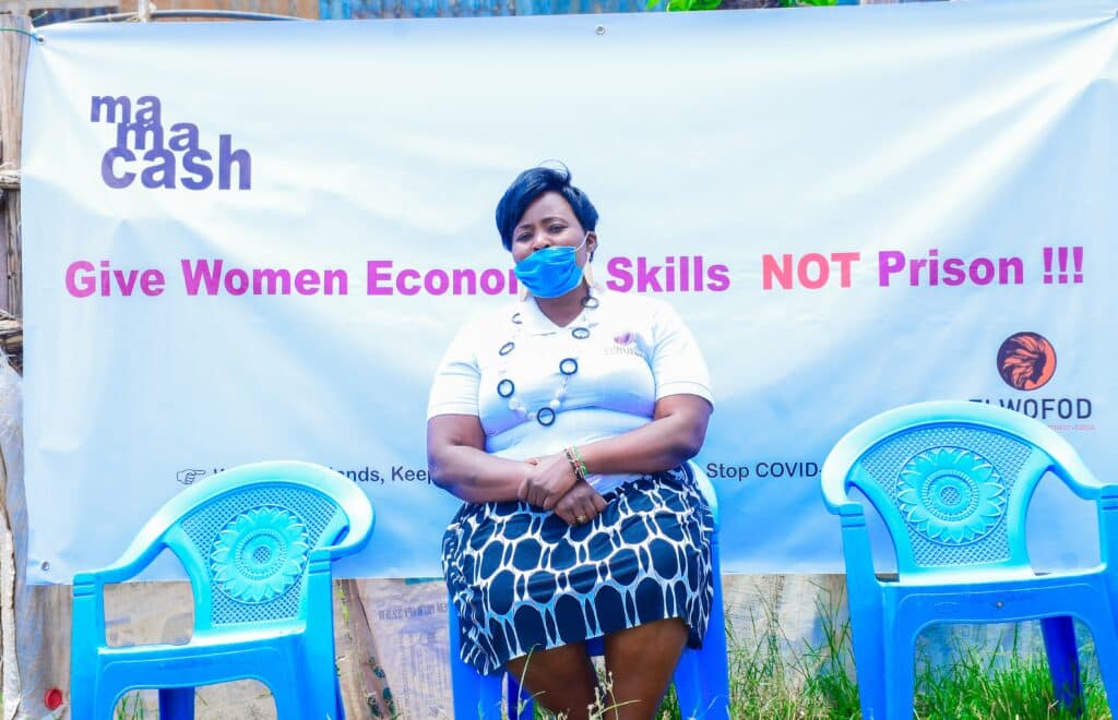 ELWOFOD the women's rights group in Kenya supporting formally incarcerated women. Text on the banner: Give Women Economic Skills NOT Prison!!!